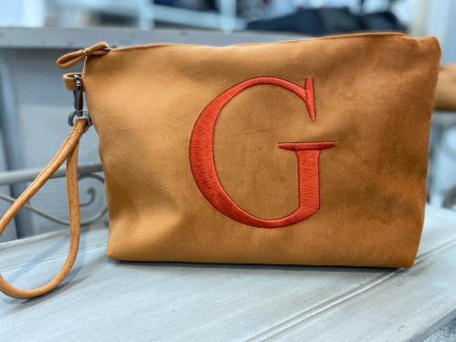 CLUTCH GRANDE bruciato con iniziale arancio